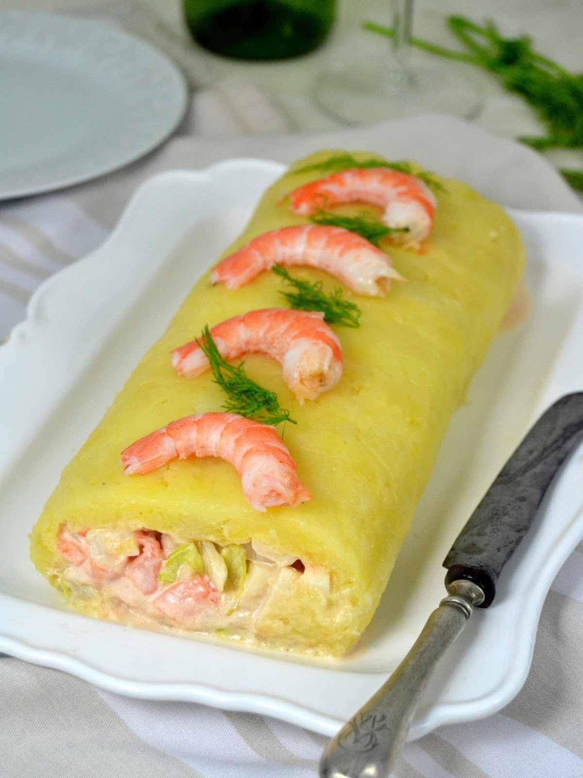 rollo de patata relleno de langostinos