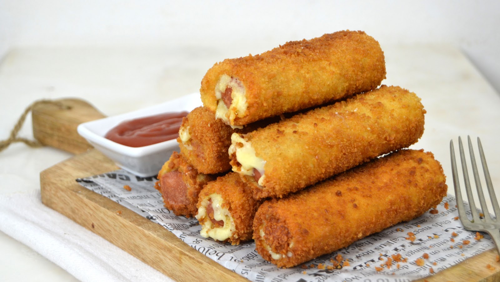 Rollitos de salchicha y queso con pan de molde - Juanan Sempere